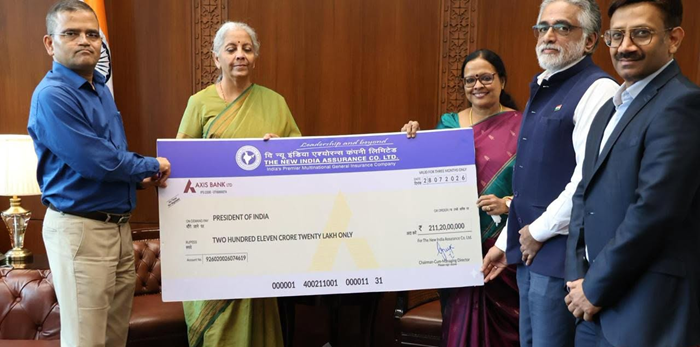 New India Assurance CMD presents dividend cheque to Finance Minister